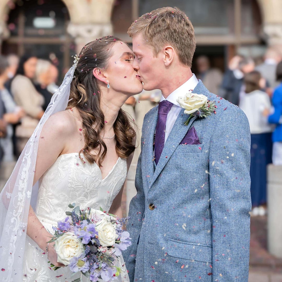 bride and groom kissing