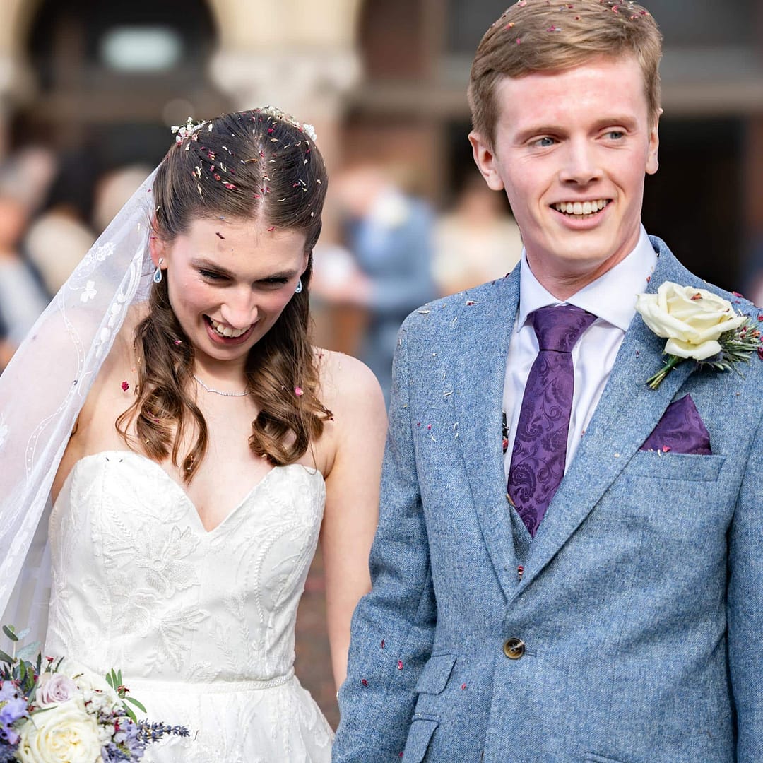 bride and groom during confetti shot