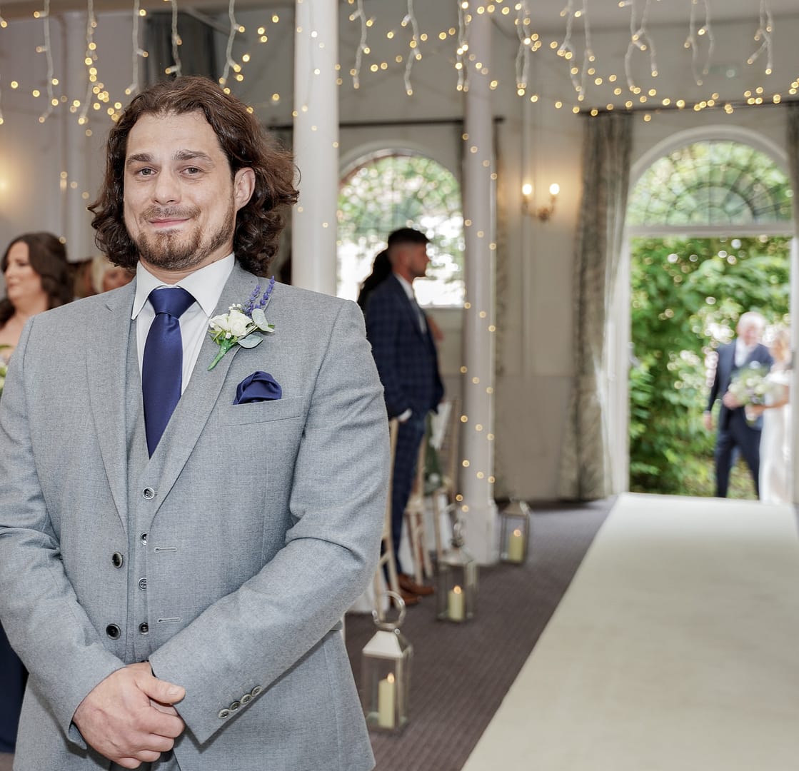 groom waiting for bride to arrive at wedding ceremony