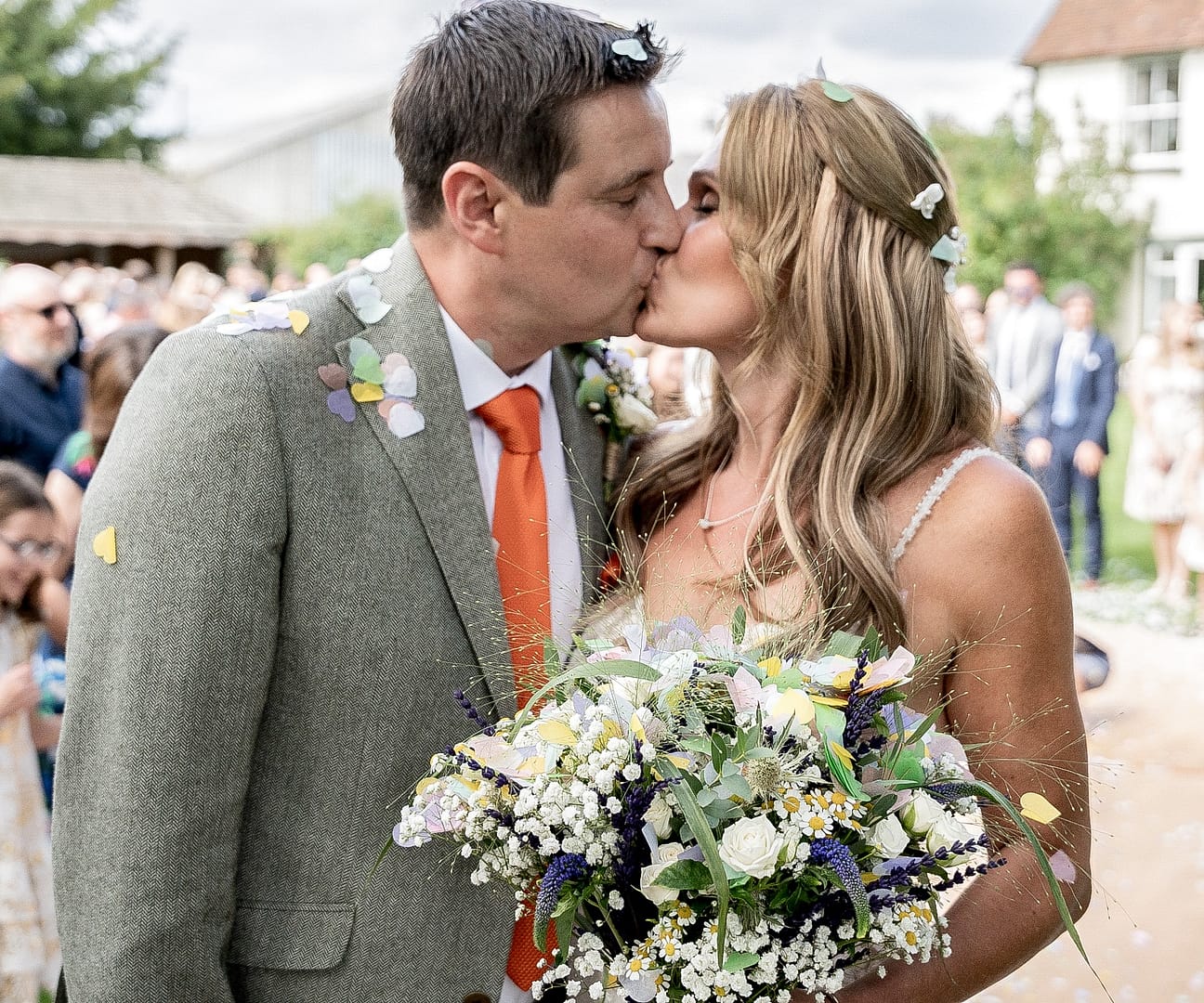 bride and groom kissing on wedding day