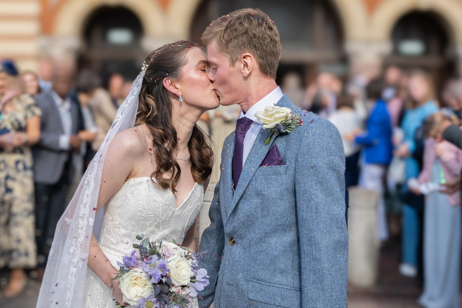 bride and groom kissing