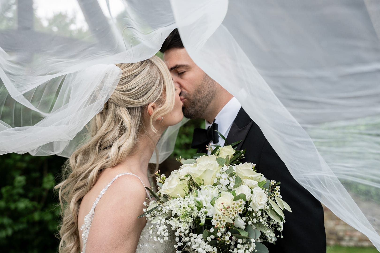 bride and groom kissing