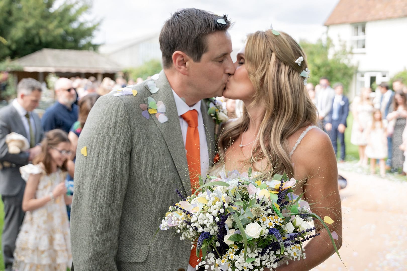 bride and groom kissing on wedding day