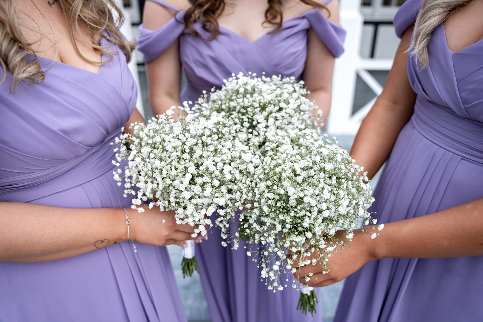 brides and bridesmaid’s in lavender dresses at the london shenley club