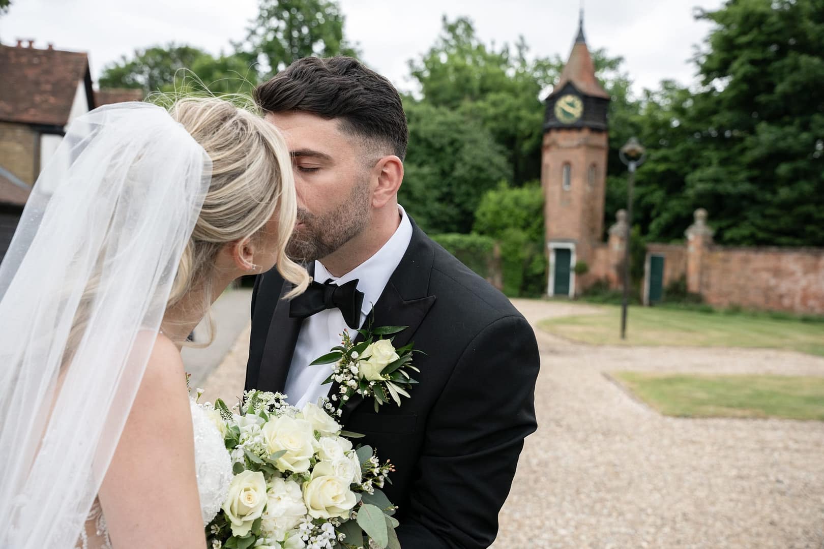 bride and groom kissing