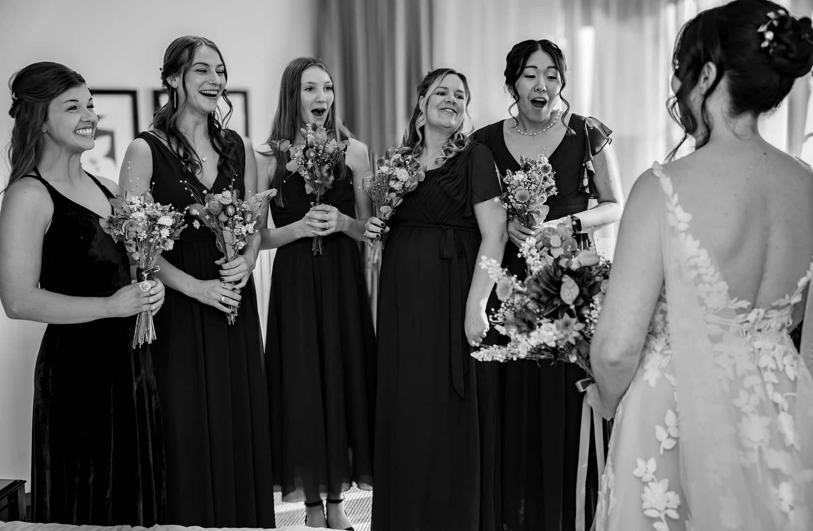 bridesmaids seeing bride for the first time